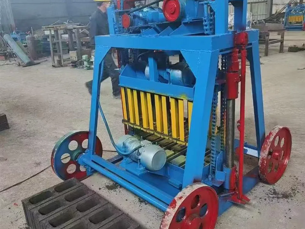 Egg laying block machine operation showing mobile concrete block production