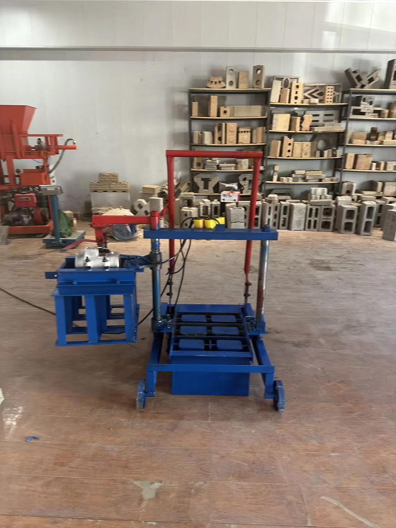 Mobile block making machine parked in a workshop ready to move between job sites